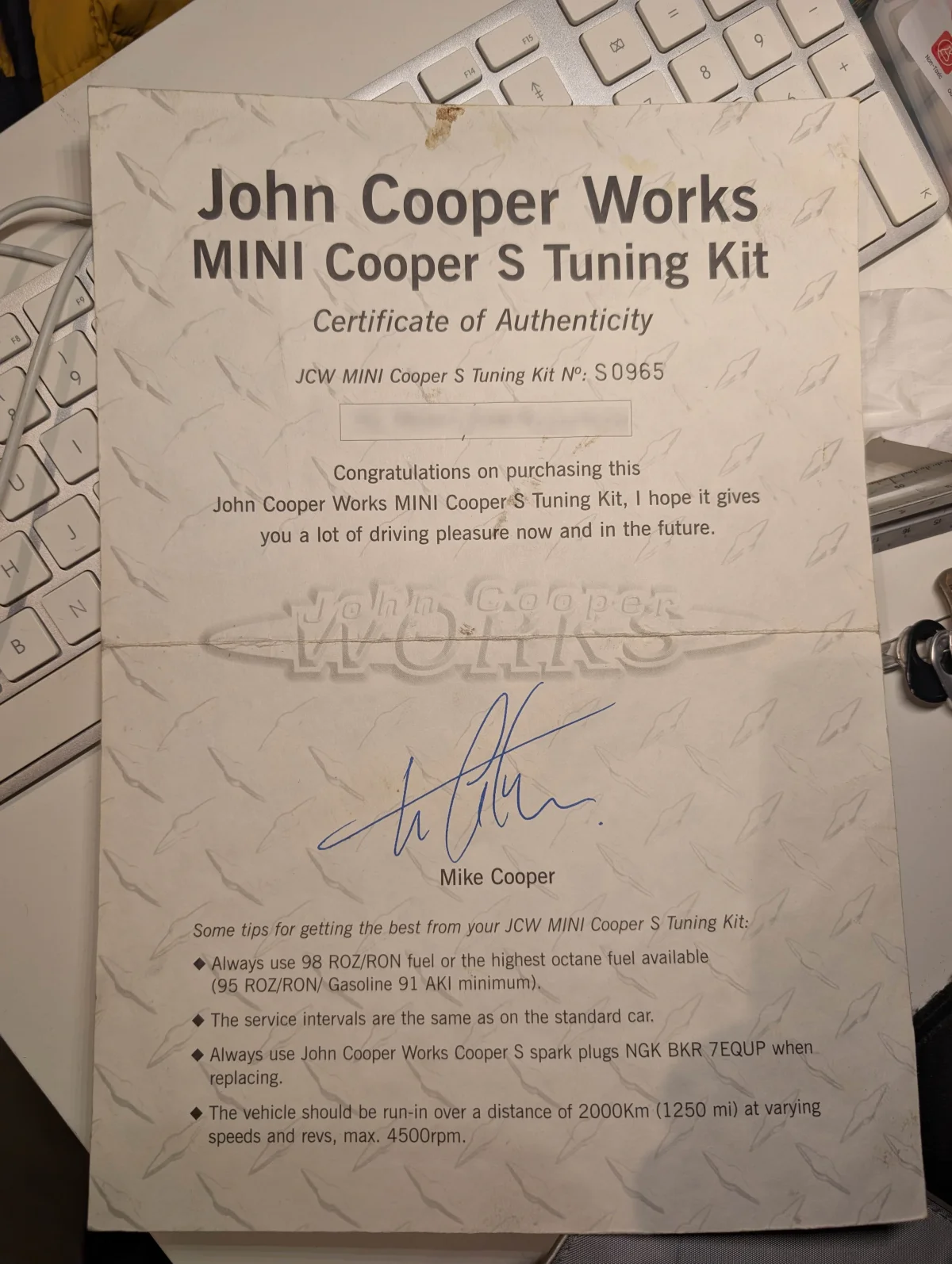 Certificado de autenticidad del kit JCW Tuning firmado por Mike Cooper